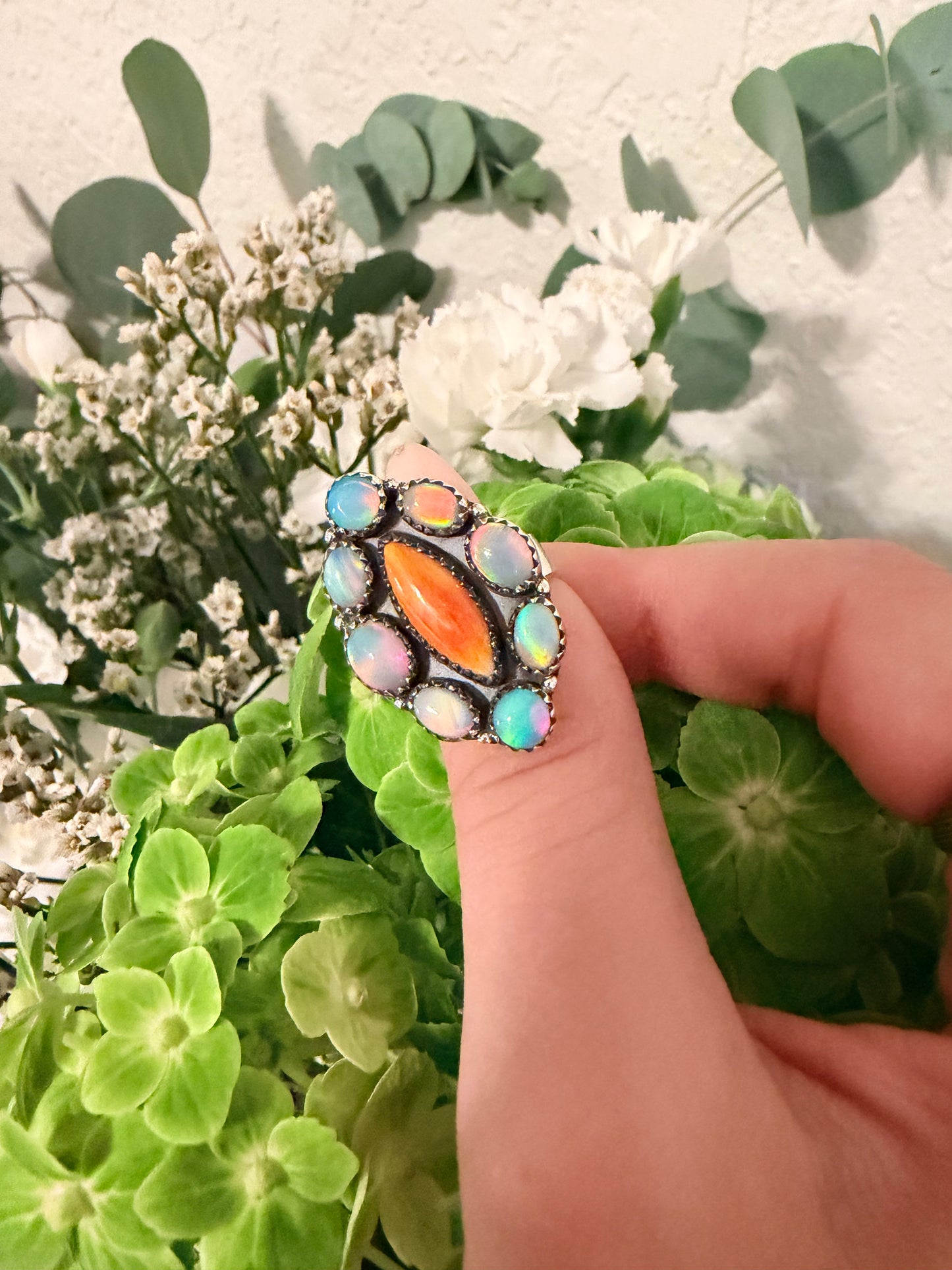 Opal and orange spiny ring