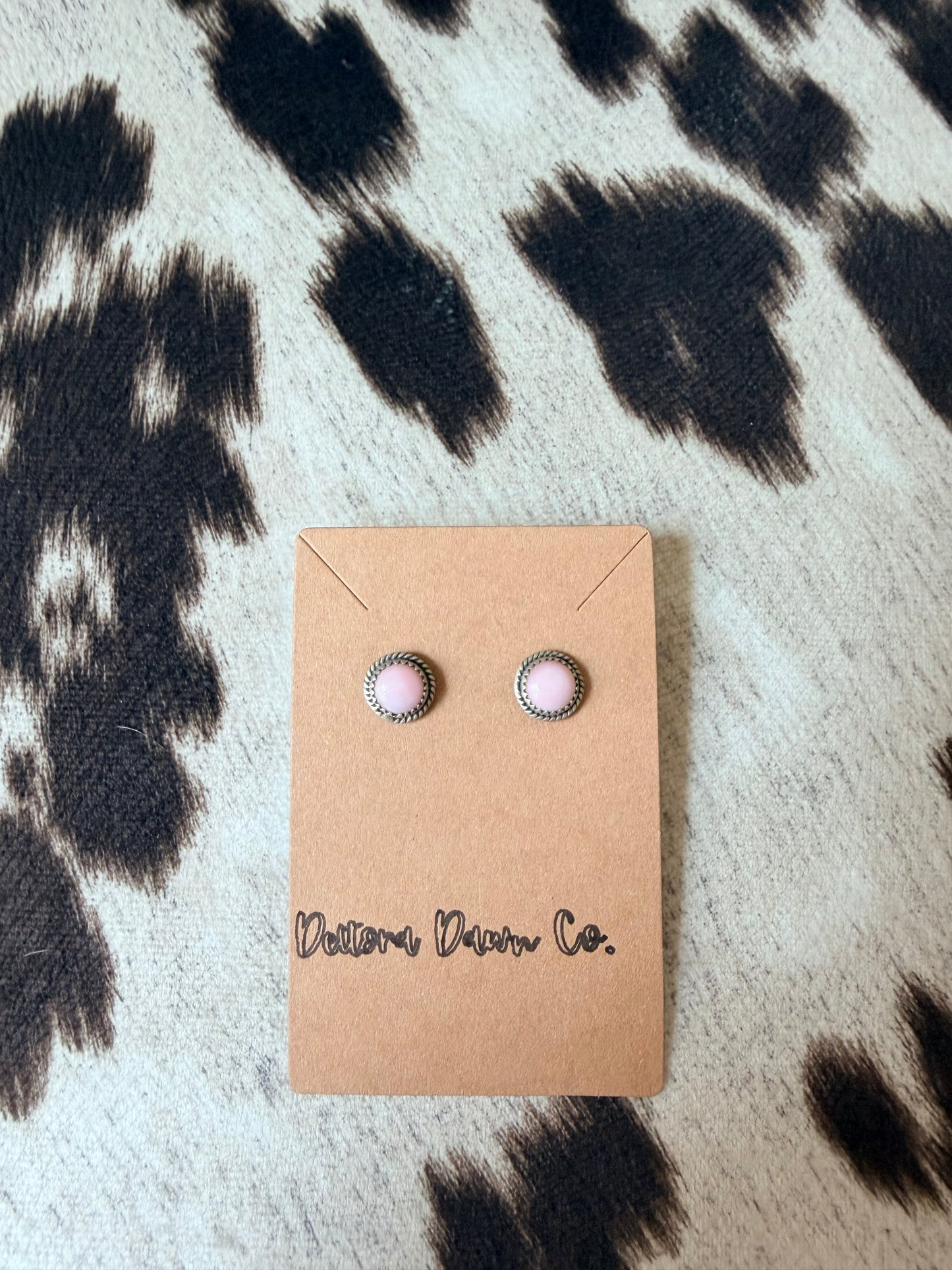 Pink conch studs